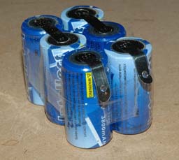 New battery pack with holes punched in the tabs